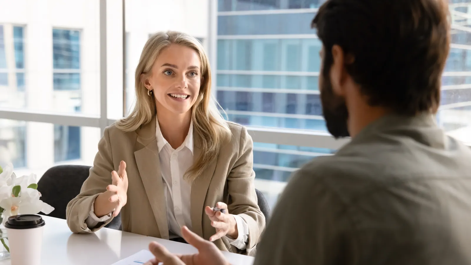 Business consultant and coach meeting with a client